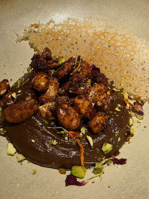 Chocolate mousse with caramelized almonds and hazelnuts at roots in Porto