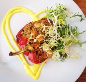 Estrella with Love! Grilled paprika filled with bulgur, olives, sundried tomatoes, smoked tempeh and feta cheese. Saffron mayo. at Estrella in Prague
