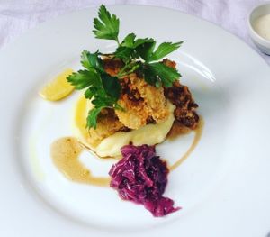 Fried oyster mashrooms with parsley, potatoe-celery cream with red cabbage. at Estrella in Prague