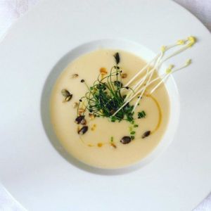 Celery - parsley cream with sesame oil, pumking seads and asparagus sprouts. at Estrella in Prague