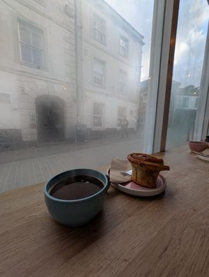 Coffee and cinnamon bun at Yonder   in Keswick