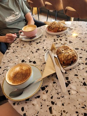 Latte and hazelnut pan au chocolate at Yonder   in Keswick