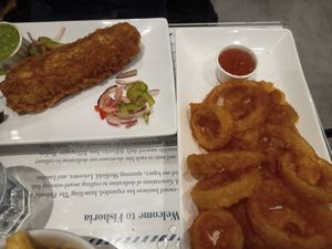 Fish and onion rings at Fishoria Fish and Chips in London