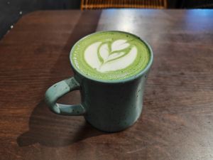 Matcha Latte with Sprouts Pea Drink at Wild Bowls - Bleicherweg in Zurich