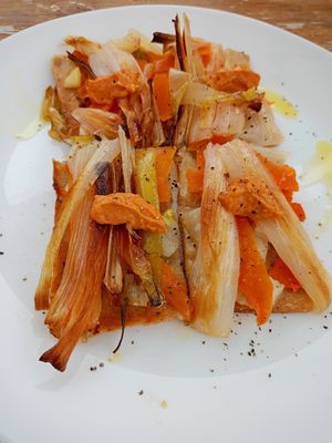 Coca de recapte de calçots at La Cort Montseny in Ducat Del Montseny