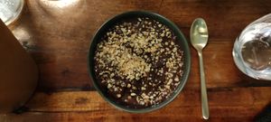 Fuelan choco, half fondant, half mellow, hazelnut praline chips.
 at Les Tontons Veg - Paradis in Paris