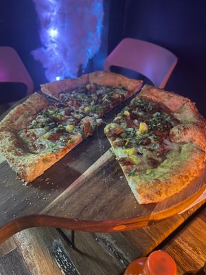 Mexican pizza, this crust and vegan cheese(made in house) are amazing. The toppings were so good too! at Marcello's Plant Based Pizza in Cabo San Lucas