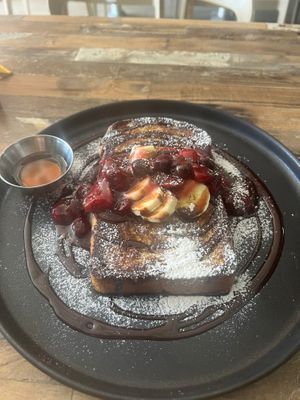 The best homemade bread! The flavors of the French toast, so good! We usually don’t do sweet breakfast but couldn’t resist this every day. Must try! at Marcello's Plant Based Pizza in Cabo San Lucas