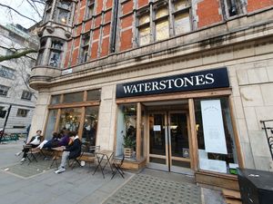 Entrance and outdoor seating at Dillons Coffee in London