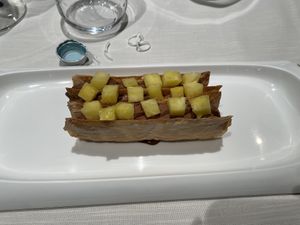 Millefoglie con mousse al cioccolato e cocco e ananas   at Aroma   in Turin