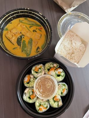 Panang curry and fresh rolls takeout  at M Thai Restaurant in Bangor