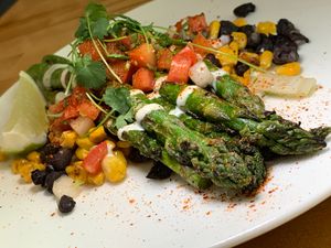 Grilled Asparagus: Black Beans, Corn, Pico de Gallo, Tofu Crema, Tajin, Lime (Kalamazoo Vegan Chef Challenge 5/26) at Roca in Kalamazoo