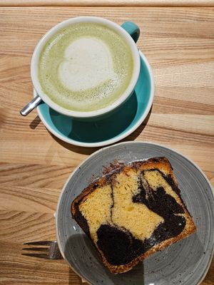 Matcha Latte with oat milk and marble cake at Birdie & Co  in Dusseldorf