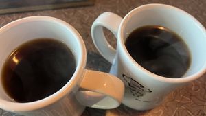  Black coffee in ceramic mugs at Biscuits Cafe  in Beaverton