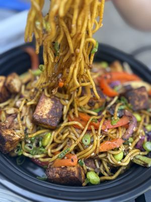 Yakisoba noodles with marinated tofu  at Vital Creations Vegan Bistro in Seattle