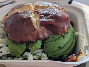 BBQ tofu burger plus avocado at Vital Creations Vegan Bistro in Seattle