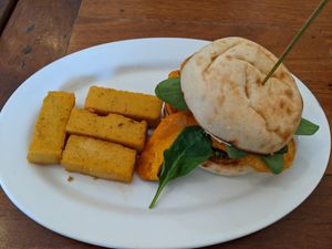 Veggie burger with polenta chips at Gnostic Mana Cafe in Woy Woy