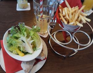 Vegan side salad and french fries at Cafe Extrablatt in Leverkusen