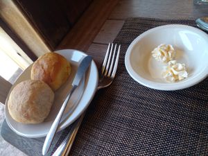 Whole wheat roll and Carrot roll with butter at Belmont Estate in Belmont