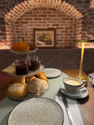 Continental breakfast, homemade jams, Belgian chocolates, fresh juices, hot drinks, even plantbased croissants at Hotel Malleberg in Bruges