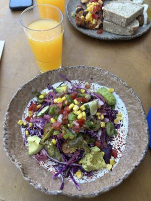 Latin lover salad and carrot orange juicee  at Honest Greens in Lisbon