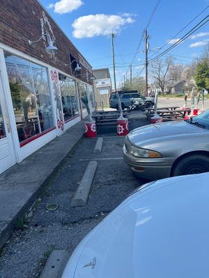 front with parking/ outdoor seating at Pasta Garage in Lexington