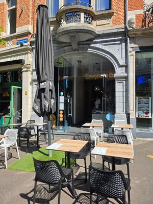 Front and outdoor seating at Croque 'n Roll Leuven in Leuven