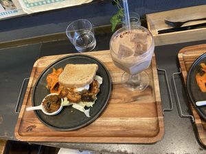 Tandoori chicken sandwich with iced chocolate chai   at anthrop. in Tokyo