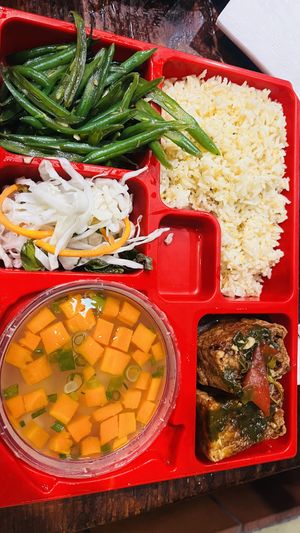 5 in 1 mealbox: Fried rice, vegetarian stuffed tofu with mushroom medley, stir fried green beans with garlic, cabbage pickle and potato soup with carrot  at Vn Street Foods in Marrickville