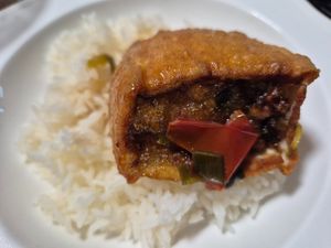 Mushroom stuffed tofu tomato w/rice $13: very good, stuffing is mostly tofu w/ tiny bit mushroom. Subtle sauce at Vn Street Foods in Marrickville