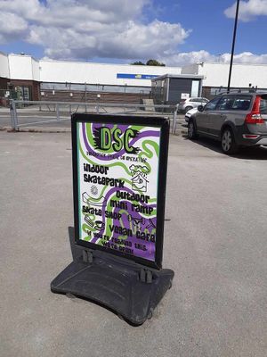 Vegan cafe sign (skate park and cafe is behind me as this photo is taken). at Doncaster Skate Co-operative in Doncaster
