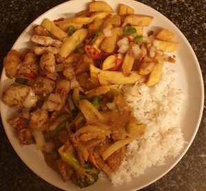 Mock chicken in satay sauce with boiled rice. Salt & pepper chips. Salt & pepper mock chicken. at Nite Nite in Wilmslow