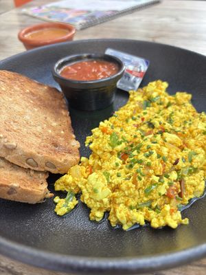 Scrambled tofu, and almond butter and toast on the side  #Veganuary at Projeto Acai - Dubai Marina in Dubai
