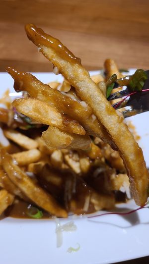 I ordered the Poutine. It was OK. I think the flavor of salt overpowered everything. Maybe need more flavor instead of just taste of salt. Fries is good. I appreciate microgreens. at Benaras in Edmonton