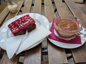 Raspberry brownie and Peru hot chocolate with soy at Choco Cafe in Prague