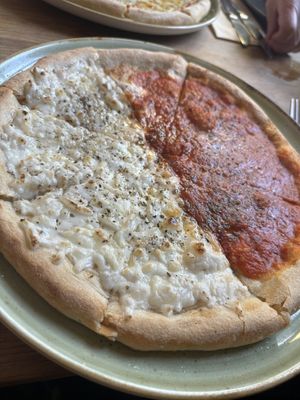 Half half garlic bread with cheese and tomato  at Elliot's Bistro in Chorley