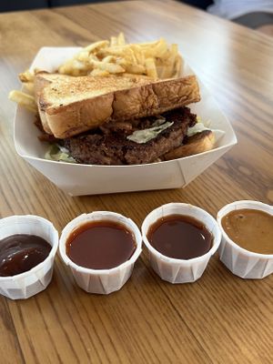 All four BBQ sauces offered are vegan!  at Walt Disney World - Regal Eagle Smokehouse in Lake Buena Vista