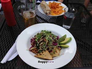 The California: quinoa (or brown rice), avocado, sun-dried tomatoes, and toasted nuts with arugula and tofu. at Lola's Kitchen in Toronto