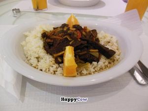 Seitan meat with orange sauce and rice at Cafe A Brasileira in Coimbra