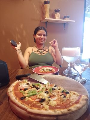  at Mi Pizza  in Liberia