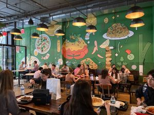 Places to sit in food hall at Jakarta Munch in New York City