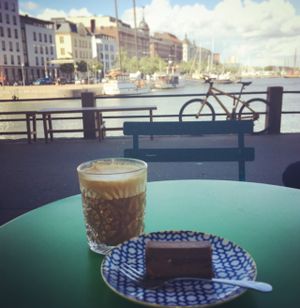 raw triple chocolate slice and an oat milk latte!  at Johan and Nystrom in Helsinki