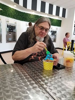 Blue raspberry fro yo, waffle cone, chocolate oat chips we brought in.  The drink was fresh peach lemonade!   at Project Animal Freedom - Decatur, IL  in Decatur
