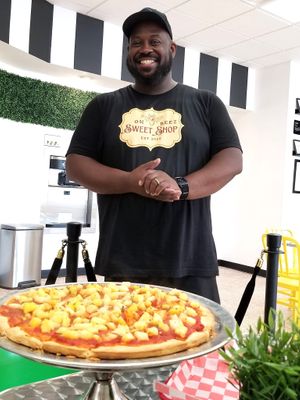 Another happy owner! The regular crusts are vegan.  This came to our table steaming! So fresh!  We had pineapple topping with some spices, & there are other toppings available. at Project Animal Freedom - Decatur, IL  in Decatur