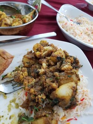 Aloo Gobi, dry.  (There's more in the bowl - large serving!)  Potatoes, cauliflower, onions and spices.     at Project Animal Freedom - Decatur, IL  in Decatur