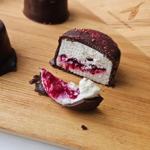 Curd cakes with berry jam at Moonihelves in Tallinn