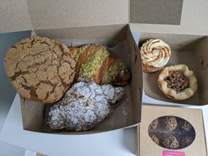 Ginger cookie, two filled croissants, cupcake, pecan tart and truffles at Sophie Sucree in Montreal