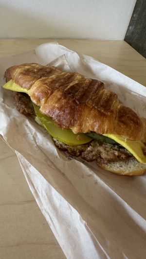 Breakfast sandwich (egg, sausage, cheese, and pickle)  at Sophie Sucree in Montreal