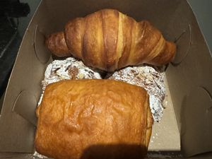Pictured: regular croissant, chocolatine, and almond croissants  at Sophie Sucree in Montreal