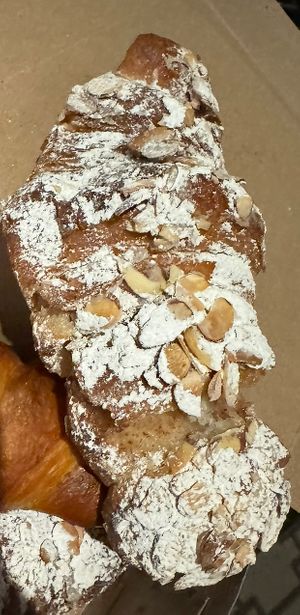 Close-up of the almond croissant (tore slightly when I picked it up, was still warm!)  at Sophie Sucree in Montreal